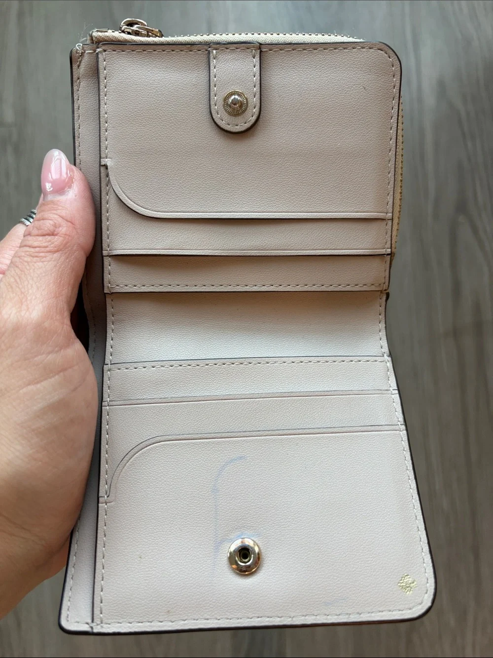 kate spade metallic rose gold zip-around wallet